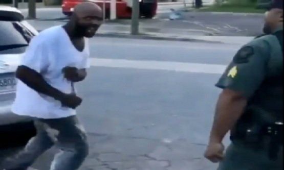 Man Knocks A Cop Down With One Punch For Shoving His Mom To The Ground!