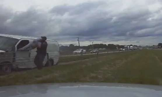 Trooper Rescues Unconscious Driver From Burning Van