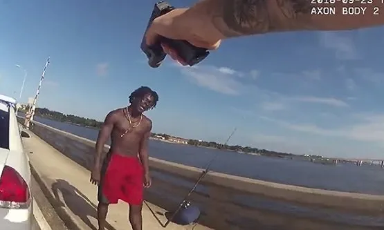 Police Officer Arrests Man for Throwing Another Man off a Bridge