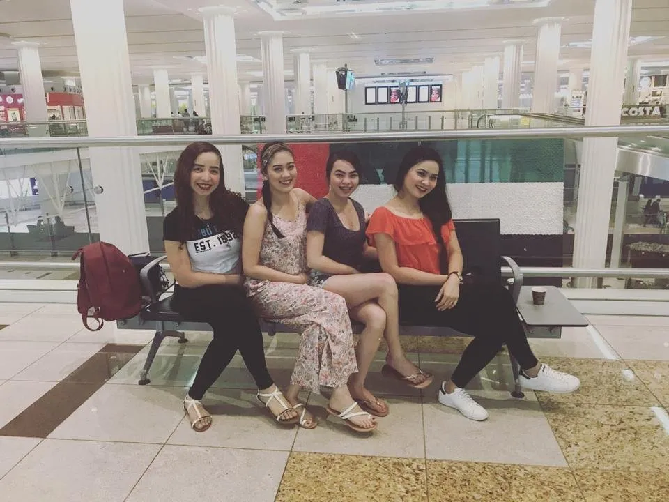 Four Angels Sitting Together
