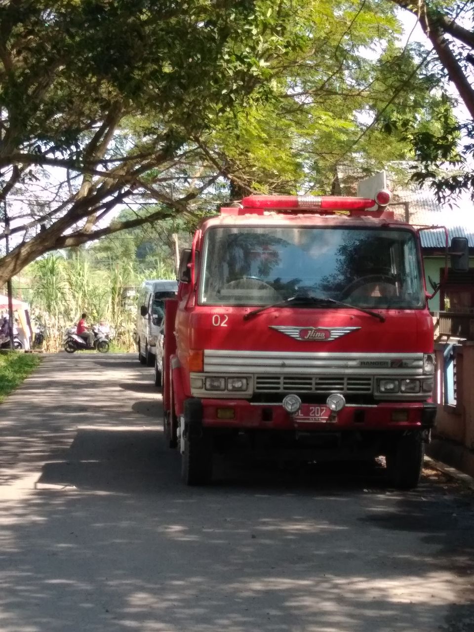 FIRE TRUCK UNDER THE TREE