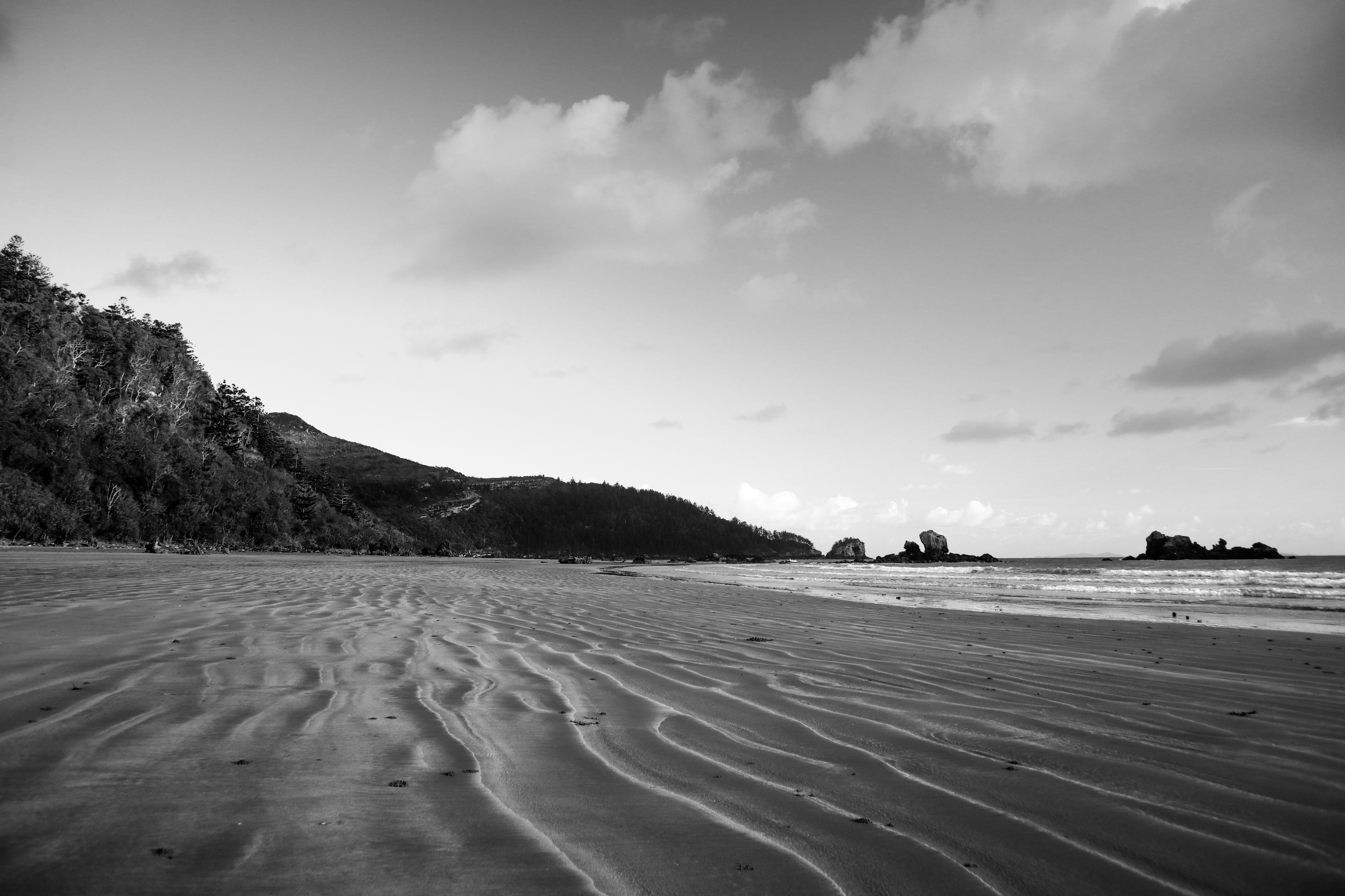 empty_and_remote_beach_on_a_sunny_summer_day.jpg