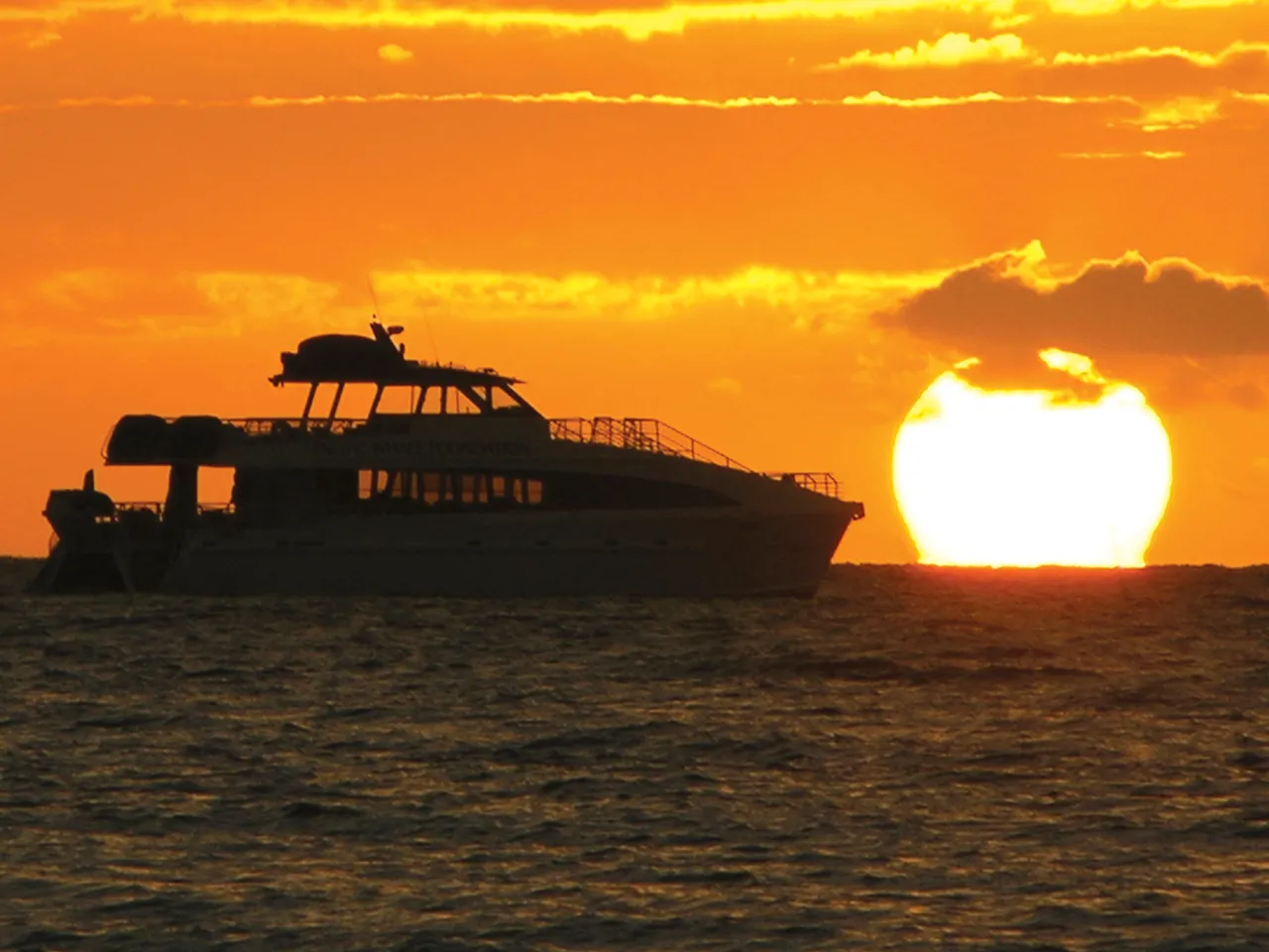 pwfsunsetboat2.jpg