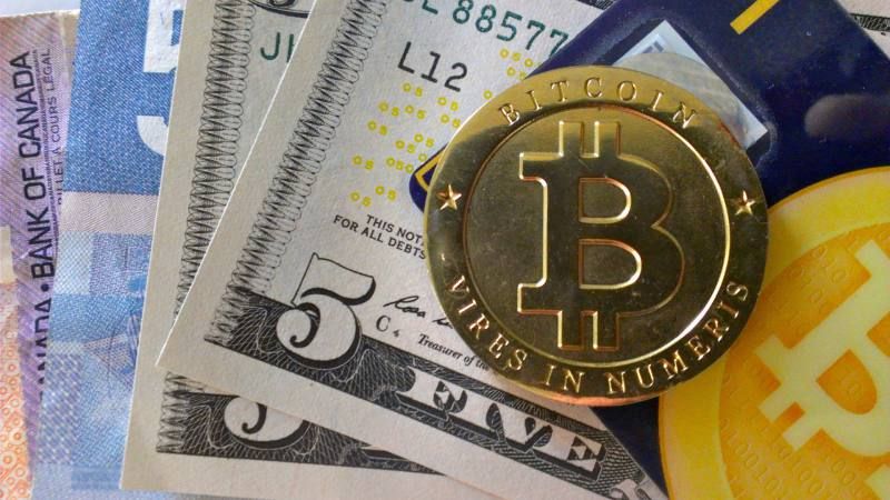 bitcoin-money_12750573_11870233.jpg