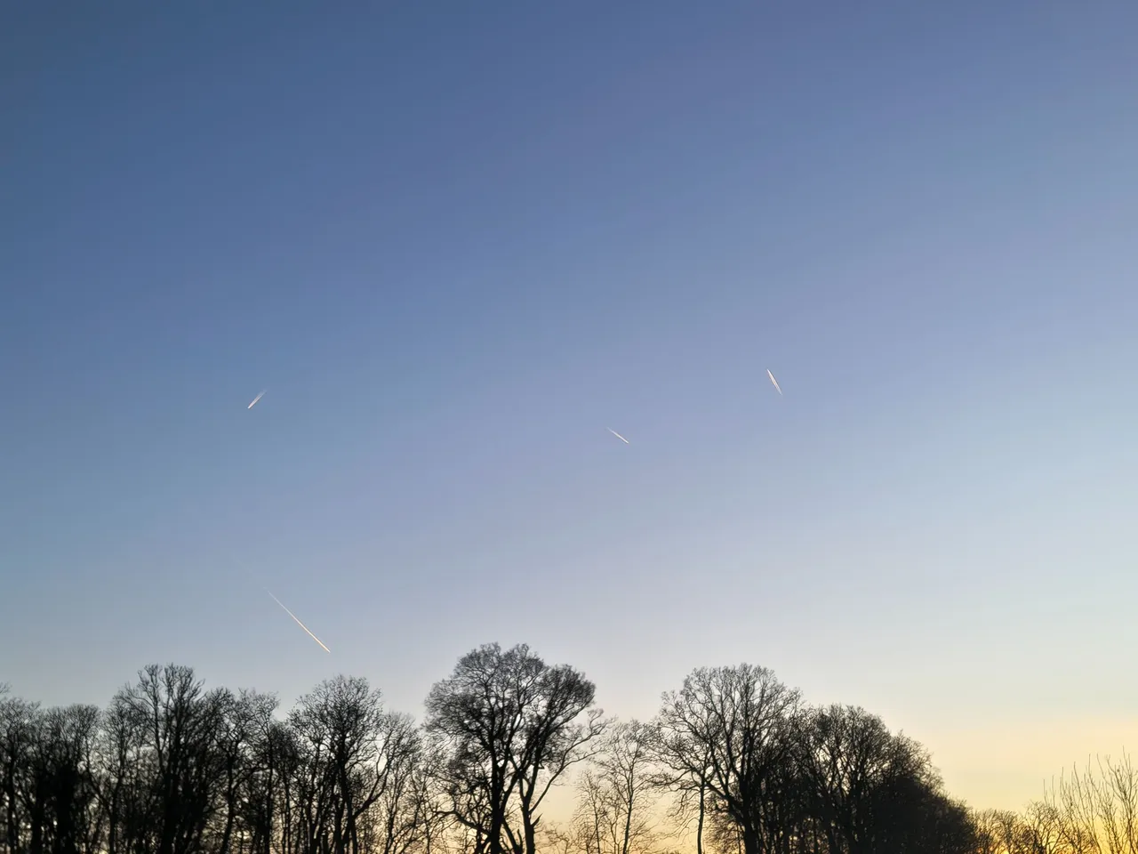 Four planes, all flying in different directions.