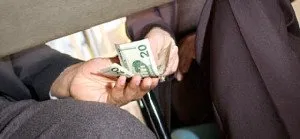 Bribe_Under_Table_Wide